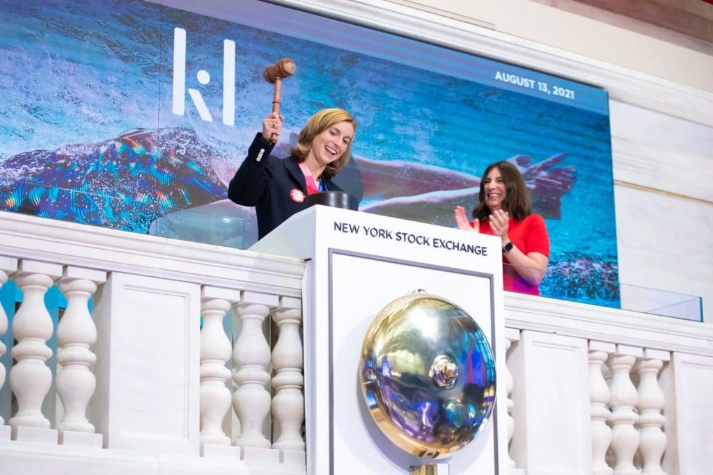 Katie Ledecky strikes the gavel after ringing the closing NYSE bell.