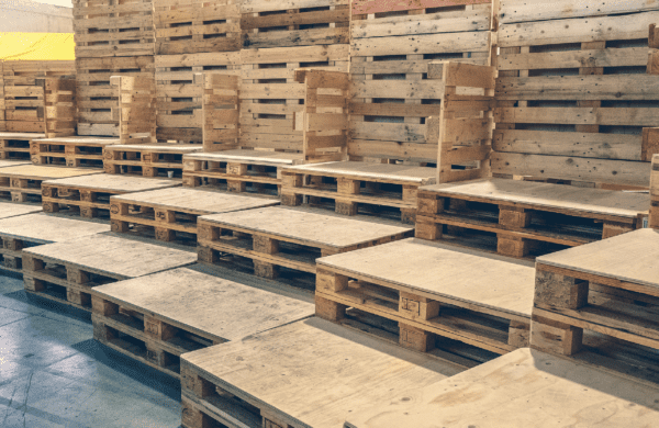 Wood pallets, representing manufacturing and supply chain